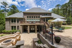 Paver patio with fire pit in a Durbin Crossing, St. Johns County FL backyard